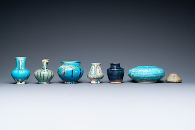Une collection de sept vases et verseuses en c&eacute;ramique &agrave; &eacute;mail turquoise, Moyen-Orient, 13&egrave;me et apr&egrave;s