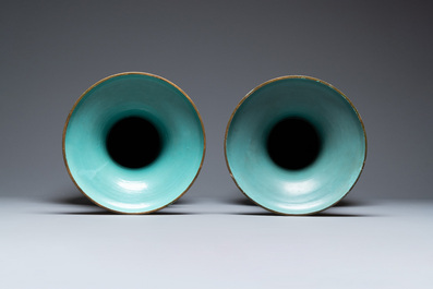 A pair of large Chinese famille rose 'dragon' vases, 19th C.