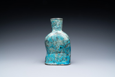 A turquoise- and black-glazed pottery figurative ewer, Kashan, Iran, 12/13th C.