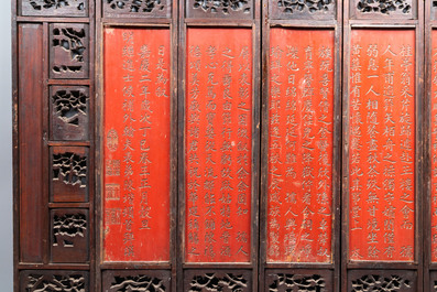 A Chinese nine-panel coromandel lacquer screen, dated 1797