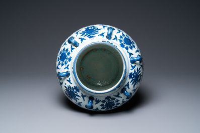 A Chinese blue and white six-handled 'lotus scroll' vase, Wanli