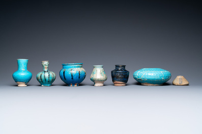 Une collection de sept vases et verseuses en c&eacute;ramique &agrave; &eacute;mail turquoise, Moyen-Orient, 13&egrave;me et apr&egrave;s