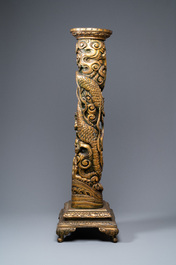 A large Chinese gilded wooden 'dragon' stand, 19th C.