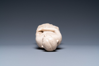 A Chinese monochrome soft paste sculpture of Adam, Kangxi