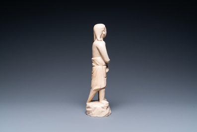 A Chinese monochrome soft paste sculpture of Adam, Kangxi