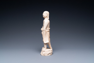 A Chinese monochrome soft paste sculpture of Adam, Kangxi