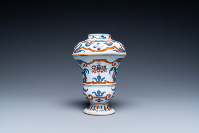 A Chinese blue, white and iron-red urn-shaped vase, Kangxi