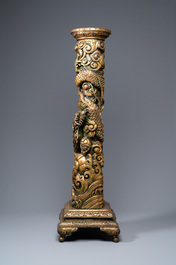 A large Chinese gilded wooden 'dragon' stand, 19th C.