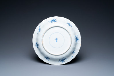 A Chinese blue and white lobed 'crab and fish' dish, Yu mark, Kangxi