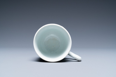A Chinese grisaille and gilt &lsquo;Provender for the Monastery&rsquo; cup and saucer, Qianlong