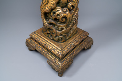 A large Chinese gilded wooden 'dragon' stand, 19th C.