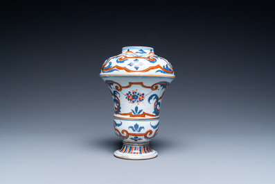 A Chinese blue, white and iron-red urn-shaped vase, Kangxi