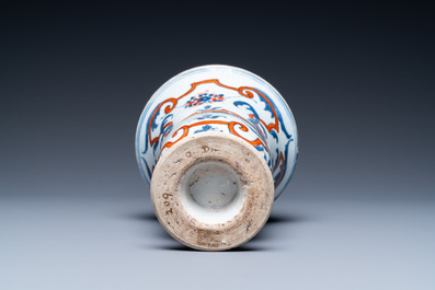 A Chinese blue, white and iron-red urn-shaped vase, Kangxi
