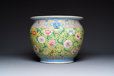 A large Chinese famille rose yellow-ground fish bowl with fine floral scrolls, 19th C.