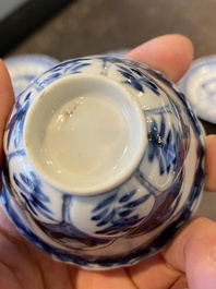 Three Chinese blue and white lotus-shaped 'acupuncture' cups and saucers, Kangxi