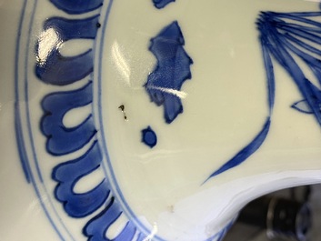 A rare Chinese blue and white bottle vase with a tiger and two butterflies, Transitional period