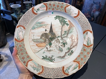 A Chinese famille verte dish with a kissing couple in a boat, Kangxi