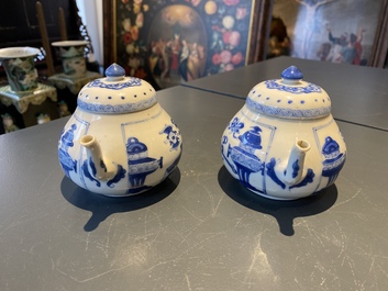 A pair of Chinese blue and white 'antiquities' teapots, Kangxi