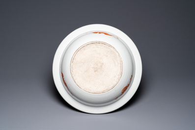 A large Chinese blue and white dish and a floral bowl, 19th C.