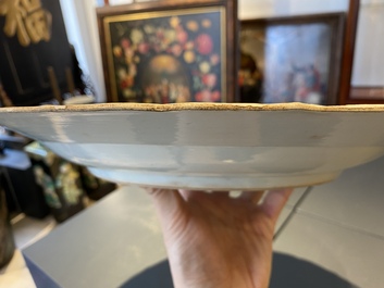 A Chinese famille verte dish with a kissing couple in a boat, Kangxi