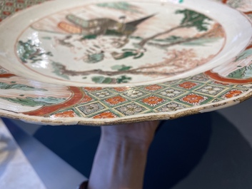 A Chinese famille verte dish with a kissing couple in a boat, Kangxi