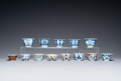 Thirty-six Chinese mostly blue and white saucers and thirty-two cups, Kangxi and later