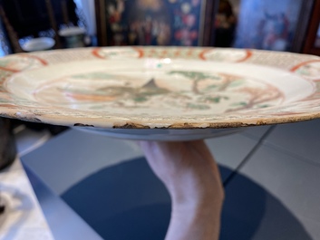 A Chinese famille verte dish with a kissing couple in a boat, Kangxi