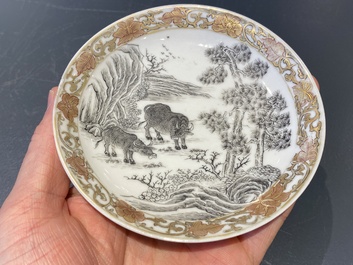 A Chinese grisaille cup and saucer with buffaloes, Yongzheng