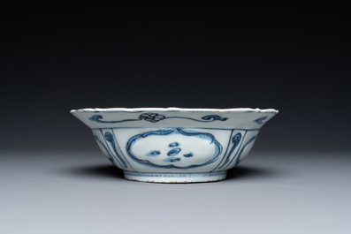 A Chinese blue and white 'cranes' plate and a kraak porcelain 'qilin' bowl, Wanli