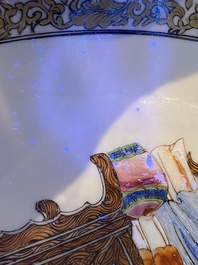 A fine Chinese famille rose plate with a mother, her son and their servant in an interior, Yongzheng