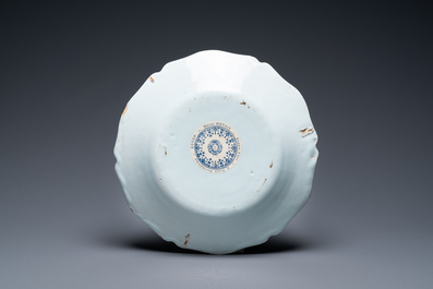 A fine polychrome French faience 'chinoiserie' dish with lobed border, Rouen, 1st half 18th C.