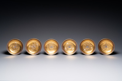 Six rare Chinese PM-monogrammed gilt-ground cups and saucers, Yongzheng/Qianlong