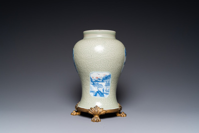 Een Chinese celadon 'lotusslingers' vaas met blauw-witte en koperrode panelen, Kangxi