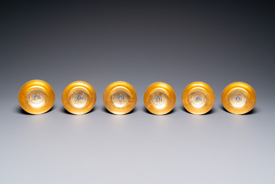 Six rare Chinese PM-monogrammed gilt-ground cups and saucers, Yongzheng/Qianlong