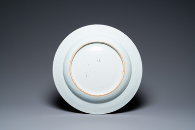 A large Chinese grisaille 'seamstress' dish, Qianlong