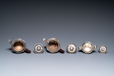 Two Vietnamese silver teapots and a sugar bowl and cover, marked Donghung, ca. 1900