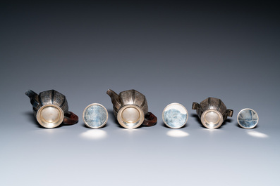 Two Vietnamese silver teapots and a sugar bowl and cover, marked Donghung, ca. 1900