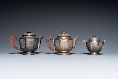 Two Vietnamese silver teapots and a sugar bowl and cover, marked Donghung, ca. 1900