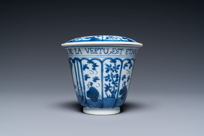 A Chinese blue and white covered cup and saucer for the French market, Kangxi