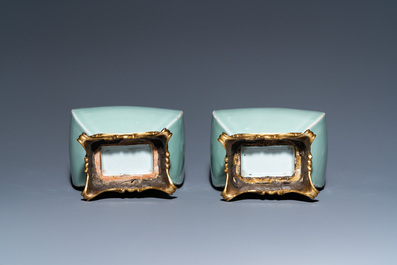 A pair of Chinese monochrome celadon vases with gilt bronze mounts, 18/19th C.