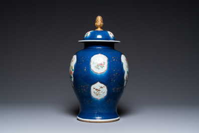A Chinese famille rose blue-ground vase and cover, Qianlong