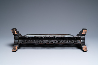 A Chinese rectangular famille rose 'landscape' plaque mounted in a wooden table screen, 19/20th C.