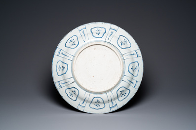 A large Chinese blue and white kraak porcelain dish with a finely painted jardini&egrave;re, Wanli