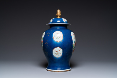A Chinese famille rose blue-ground vase and cover, Qianlong