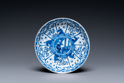 A Chinese blue and white covered cup and saucer for the French market, Kangxi