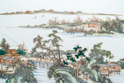 A Chinese rectangular famille rose 'landscape' plaque mounted in a wooden table screen, 19/20th C.