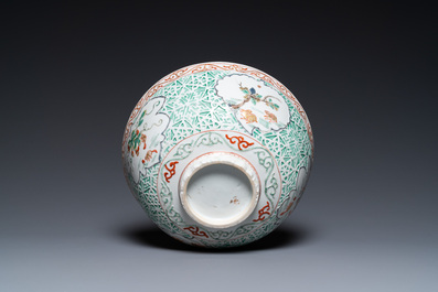 A Chinese famille verte relief-decorated bowl with squirrels and rabbits, Kangxi