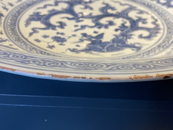 An impressive large Chinese blue and white 'dragon' dish, Ming, 2nd half 15th C.