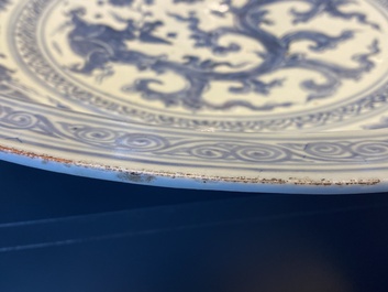 An impressive large Chinese blue and white 'dragon' dish, Ming, 2nd half 15th C.