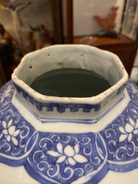 A pair of Chinese blue and white vases and covers with narrative design, Transitional period